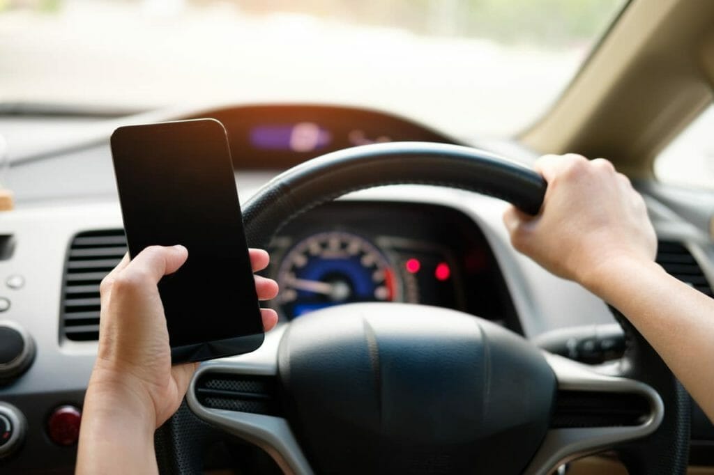 Using a cell phone while driving could me you face a distracted driver accident lawyer in Illinois if you cause an accident.