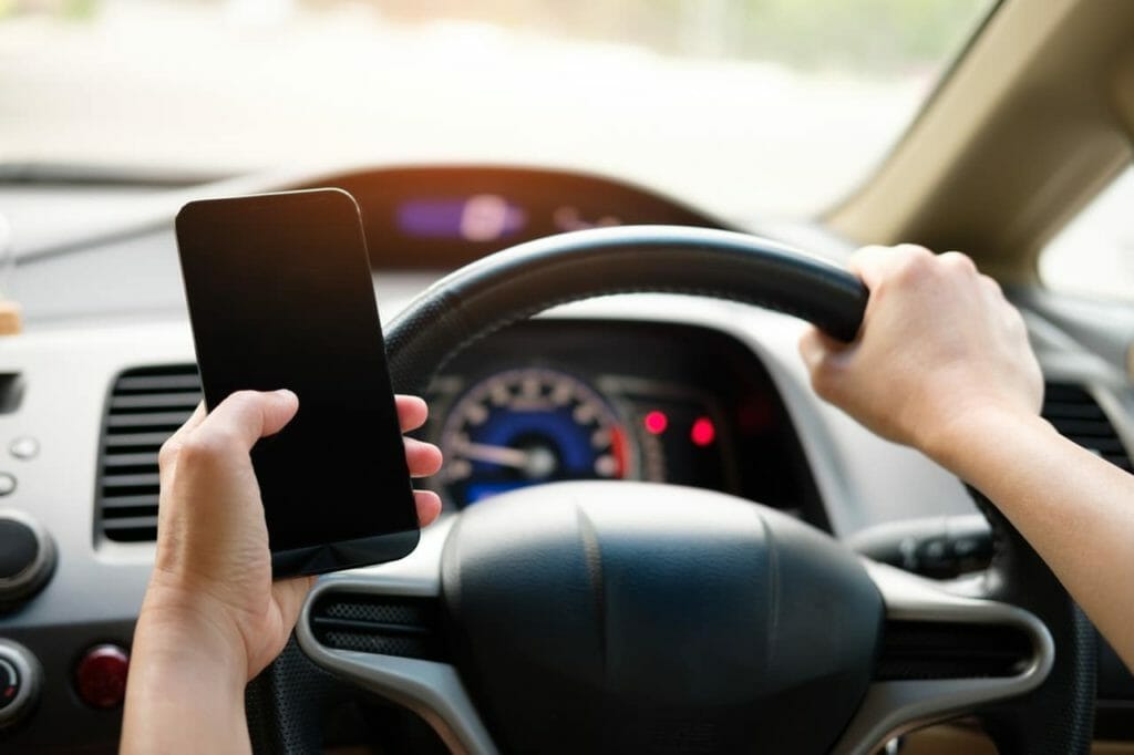 Using a cell phone while driving could me you face a distracted driver accident lawyer in Illinois if you cause an accident.